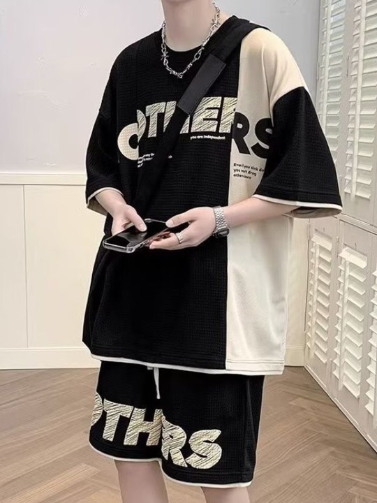 black colourblocked typography printed casual t shirt with shorts black colourblocked typography printed casual t shirt with shorts