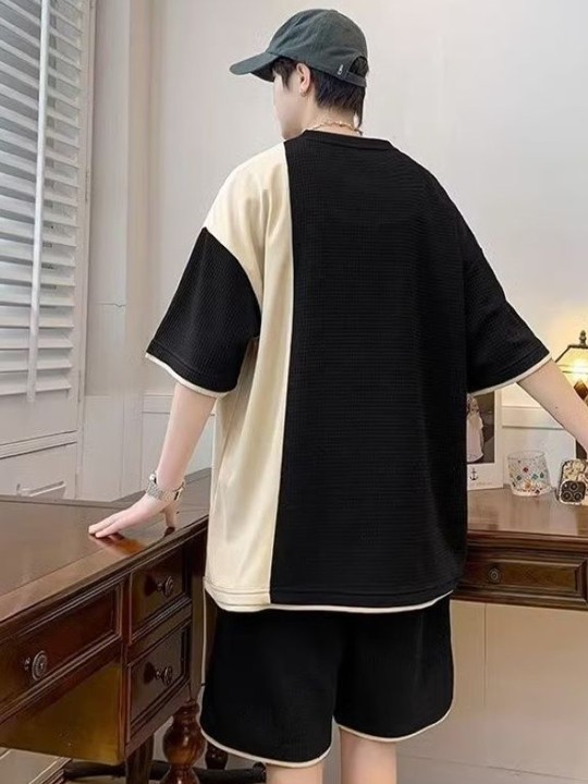 black colourblocked typography printed casual t shirt with shorts black colourblocked typography printed casual t shirt with shorts